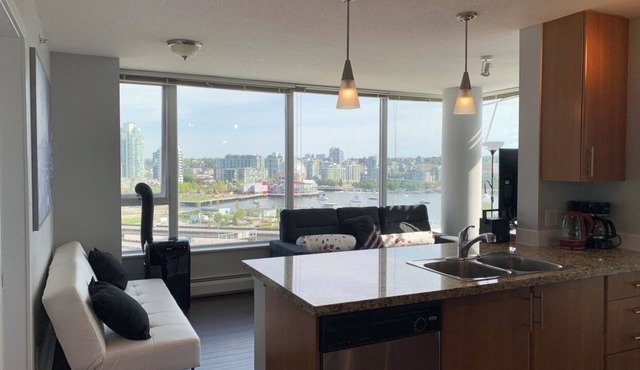 Bright 2-bedroom apartment with Portable AC in gorgeous Vancouver