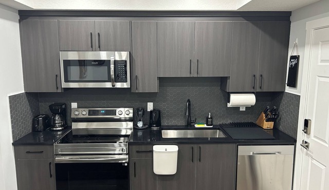 Charming 1-Bedroom Basement Walkout Suite with a Gym and Office. in Calgary