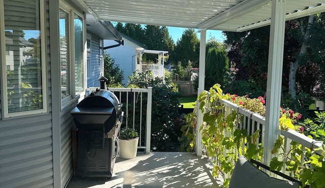 Charming 3 bedroom family home with 2 patios. 10mim to YXX, EV charging, laundry