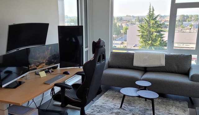 Contemporary & Pet-Friendly 1BR + Den Condo featuring a Charming Patio