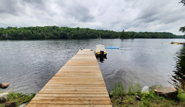 Cottage with 40' Dock! Beautiful lake with excellent fishing.