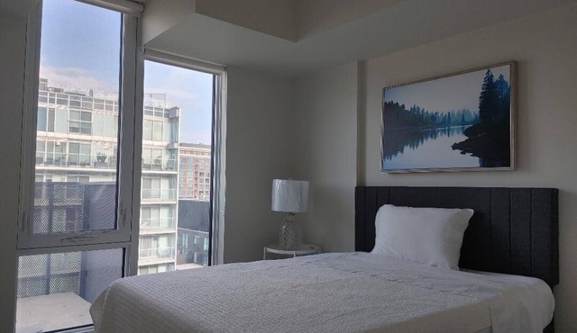 Cozy 1-bedroom plus den condo near Yorkdale mall with fitness room in Toronto