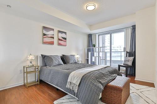 Cozy 1BR Condo with Balcony and Parking