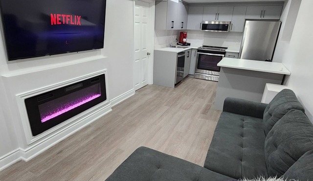 Cozy 2 Bedroom Guest Suite with Electric Fireplace