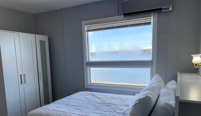 Deluxe Queen Room with beautiful views overlooking the water!