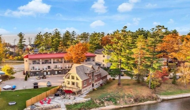 EXECUTIVE WATERFRONT LIVING AT ITS FINEST! WELCOME to this immaculate home!