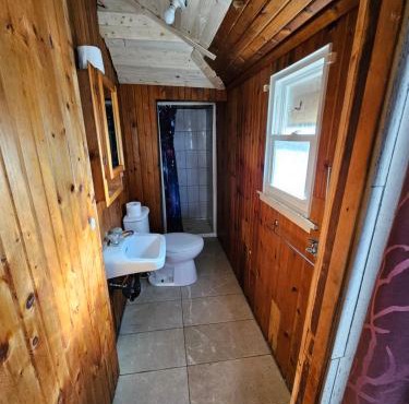 Fun Place with a Sandy Beach for Swimming, Boating & Fishing, Featuring 1 House and 3 Cabins