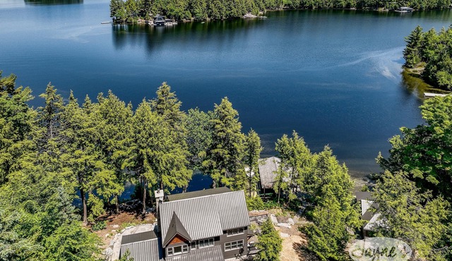 Incredible 6 bdrm luxury! 310' of Frontage! AC! Sunsets!