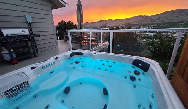Lake views beautiful 4 bedroom , 2 living rooms home with hot tub.