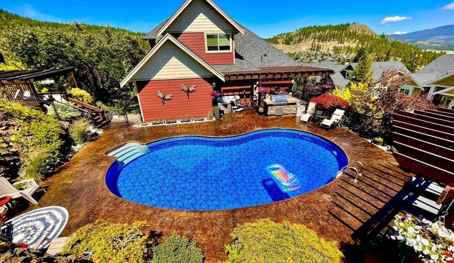 Large private home, close to everything, with gorgeous backyard pool. in Kelowna