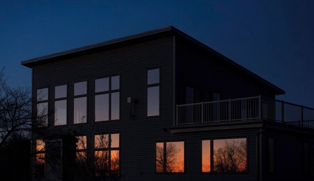 Luxury modern farmhouse on Amherst Island. 152 acres of private, scenic trails.
