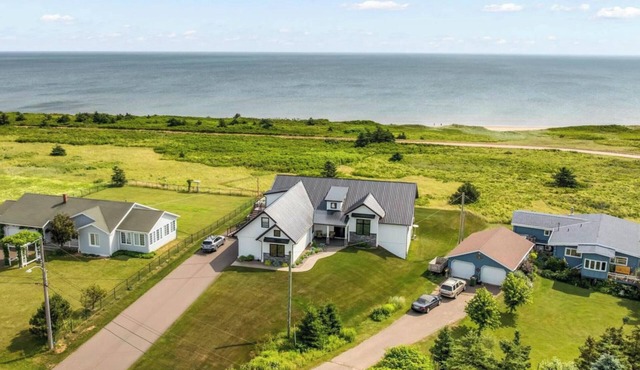 Luxury North Shore Retreat | Ocean Views | Steps to PEI National Park Beach