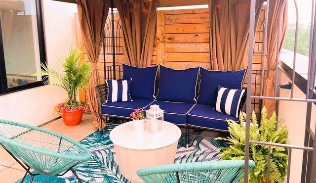 Mediterranean Lounge with Rooftop Patio