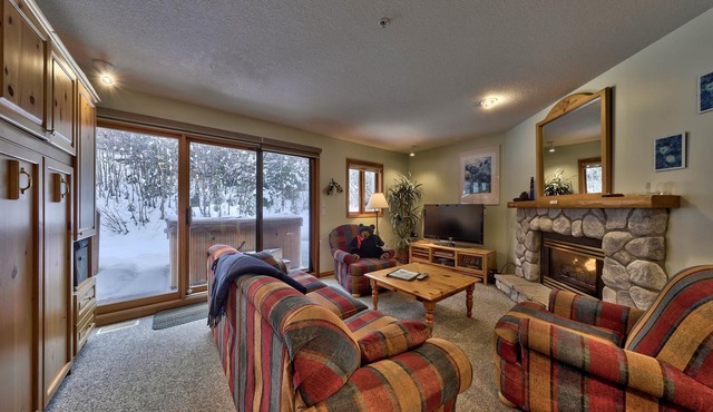 Multi level 2 bedroom condo, ground floor entrance, close to village center and next to ski runs