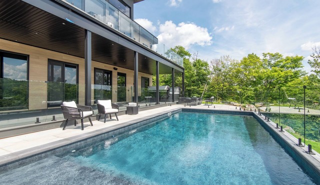 NEW! Chalet Mont-Steele | 5 Bedrooms | Hot Tub, Heated Pool & Game Room