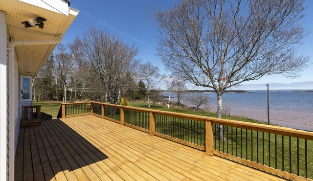 Oceanfront Bungalow on the Bay. 3 Bed 2 Bath with a large treed lot.