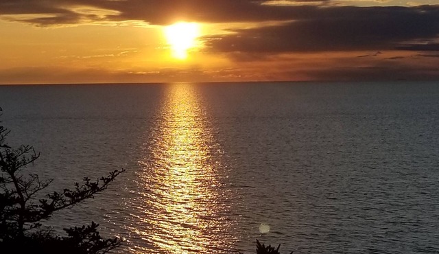 Oceanfront mini home, two decks, with spectacular views. in Meteghan