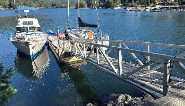 Oceanfront property in Pender Harbour with a dock, wrap around balcony with view