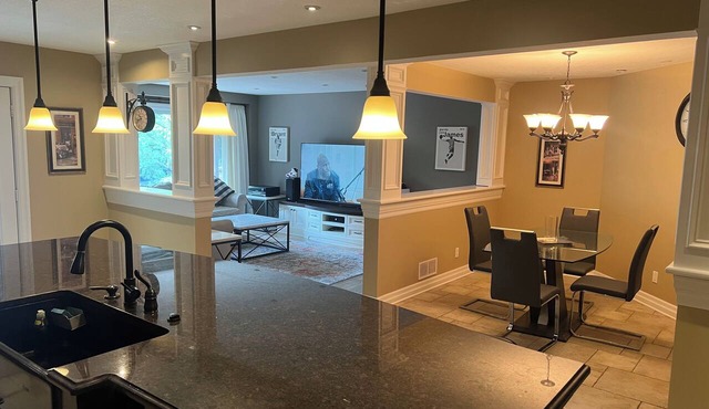 Private Home w/5 bedrooms, 3.5 baths, office, 3 living rooms, & HOT TUB.
