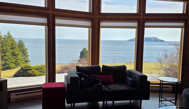 Private oceanfront home with stunning views in quiet Cribbies area of Tors Cove.