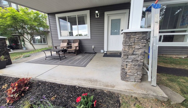 Scenic 2 bdrm walkout suite with shared hot-tub, outdoor pool, and view of park.