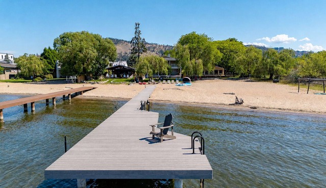 Spacious 4-bedroom home with private beach, dock, large yard, outdoor shower.