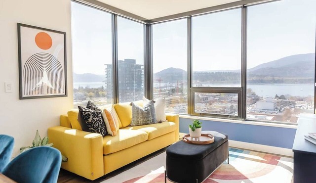 Stay at The Retro Revival, a designer condo on the 16th floor of Brooklyn on Bernard. Enjoy panoramic lake/mountain views, curated retro decor, a balcony with BBQ, rooftop terrace, and walkable access to Kelowna’s dining and waterfront.