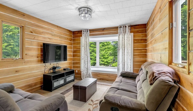 Steps from South Lake, on 9 acres surrounded by Haliburton highlands.