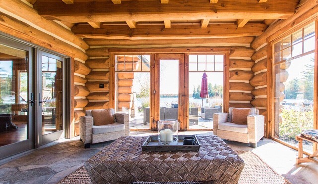 Stunning Log Cabin on 123 Acres