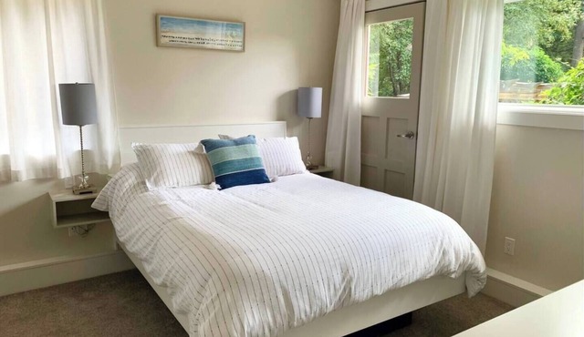 Sun drenched, beach inspired, guest suite.