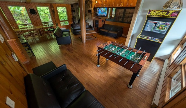 Super Spacious 2300 SF Lounge Suite with Walk Out Deck, Sunroom, Foosball, Bar