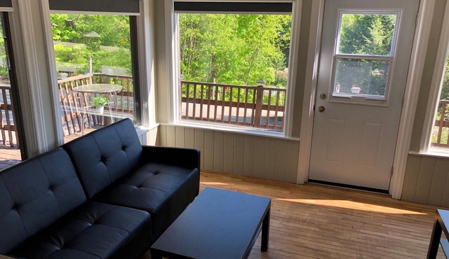 Super Spacious 2300 SF Lounge Suite with Walk Out Deck, Sunroom, Foosball, Bar