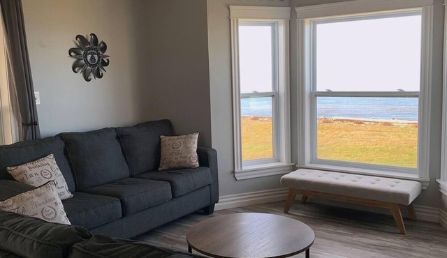 Three Bedroom Home With Screened In Porch Only Steps Away From North Shore Beach