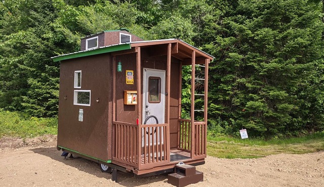 Tiny Tiny Caboose Cabin Replica in Lincoln