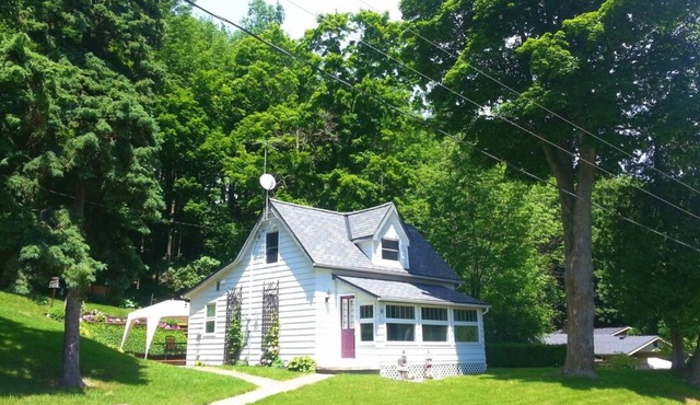 Wiffen Cottage located just a 3 minute walk to the sandy public beach!